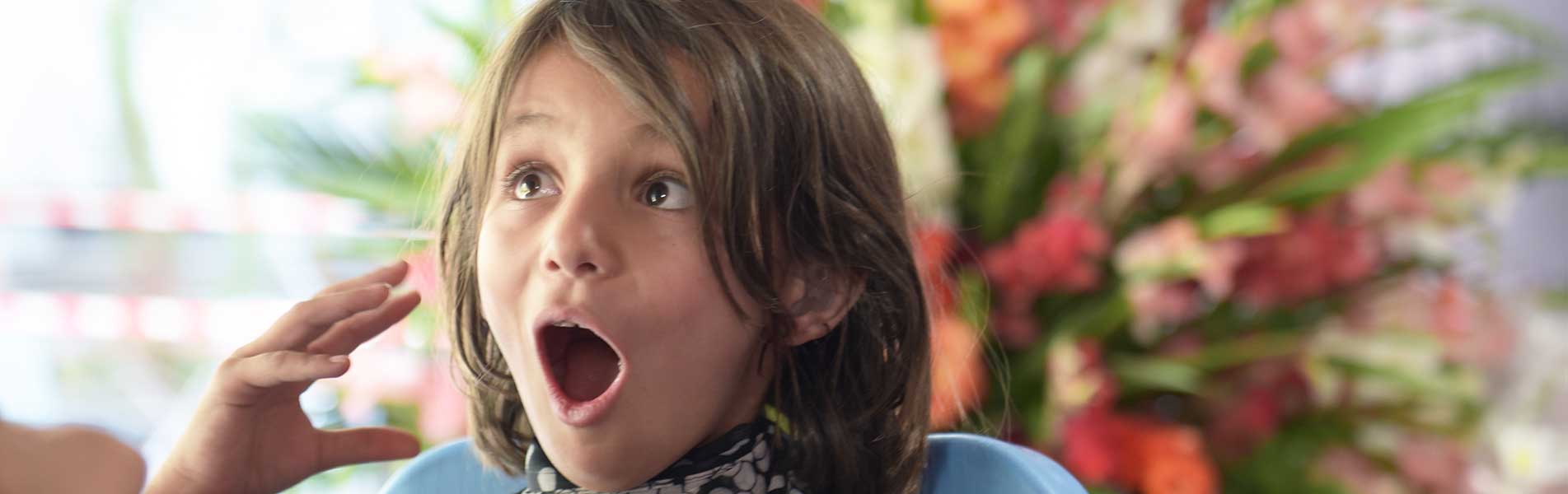 girl in Afghanistan very excited to have hearing aids