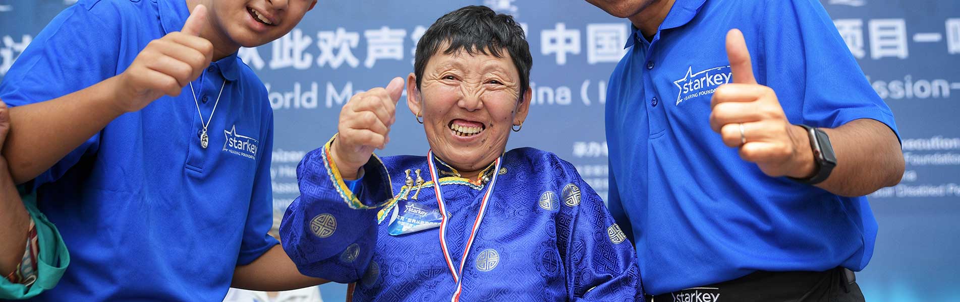 happy woman with a hearing aid