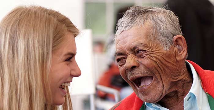 Older man very excited to have a hearing aid