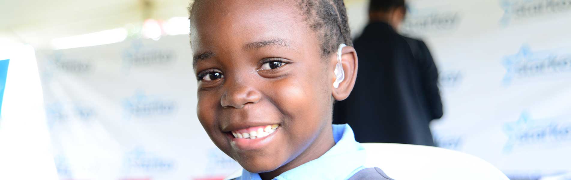 young child with hearing aids in Zambia